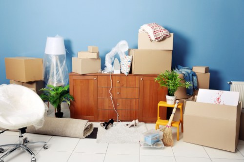 Professional team handling office furniture and equipment during a London relocation