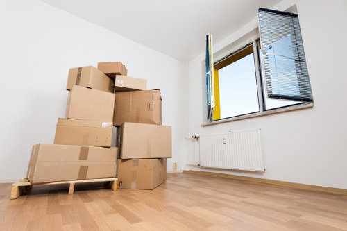 Loading household items into a removal truck in South London