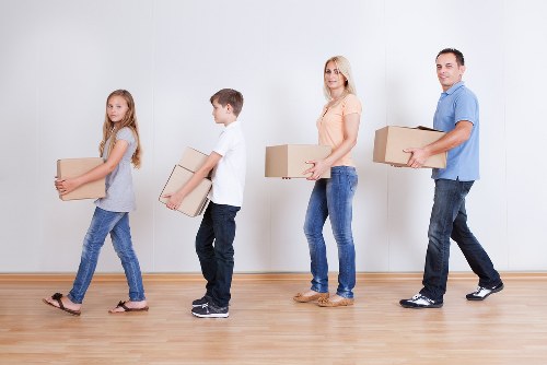 Checklist and packed boxes ready for house removals