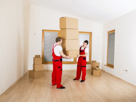 Careful wrapping of fragile household items during a local move
